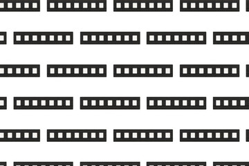 Obraz premium Film strip pattern creating a seamless abstract background for cinema, movie, media, and entertainment concepts
