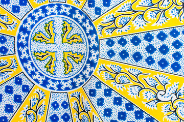 top view of white ankara fabric, flatlay of nigerian wax cloth with designs, spread out white ankara material