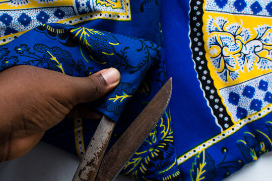 close up view of blue ankara fabric, different patterns on blue ankara material, flatlay of nigerian wax cloth