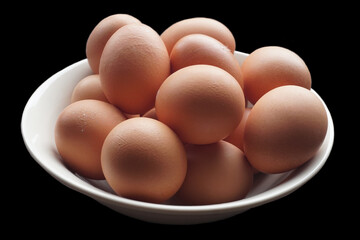 Fresh organic chicken eggs from sustainable natural farm on black background