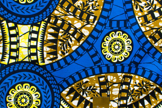 close up view of blue ankara fabric, different patterns on blue ankara material, flatlay of nigerian wax cloth