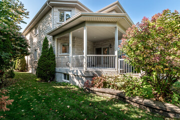 Exterior and interior of a modern Canad house with backyard, driveway, and complete living spaces. Includes living room, kitchen, bedrooms, bathrooms, hallways and basement