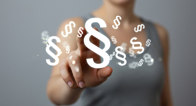 A hand interacts with a glowing digital paragraph symbol, surrounded by floating legal icons