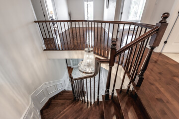 Exterior and interior of a modern Canad house with backyard, driveway, and complete living spaces. Includes living room, kitchen, bedrooms, bathrooms, hallways and basement