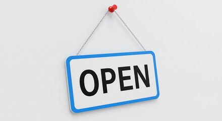 A white 'Open' sign hangs on a white wall, indicating a business is ready for customers. The blue-bordered sign is suspended by a chain and a pushpin