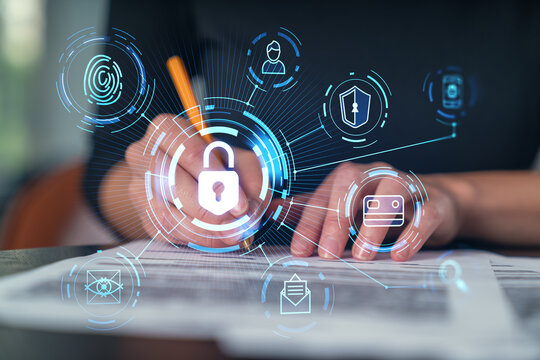 Businesswoman in formal wear taking notes signing contract at office workplace. Concept of important working moments, document sign, working process, concentration. Hands shot. Lcok icon hologram