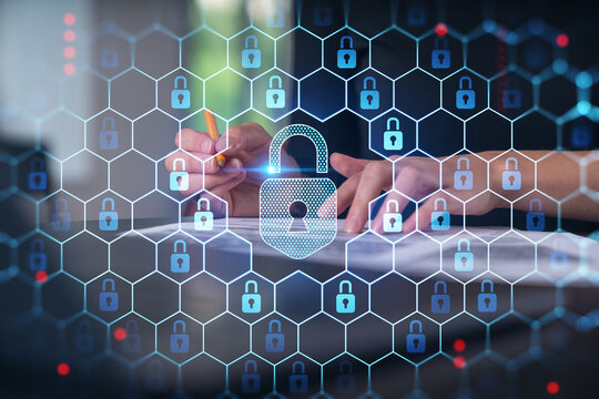 Businesswoman in formal wear taking notes signing contract at office workplace. Concept of important working moments, document sign, working process, concentration. Hands shot. Lcok icon hologram