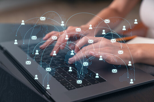 Woman typing on laptop at office workplace in background. Concept of working process, internet surfing, online business education. Student send e-mail. Close up view. Social network icons