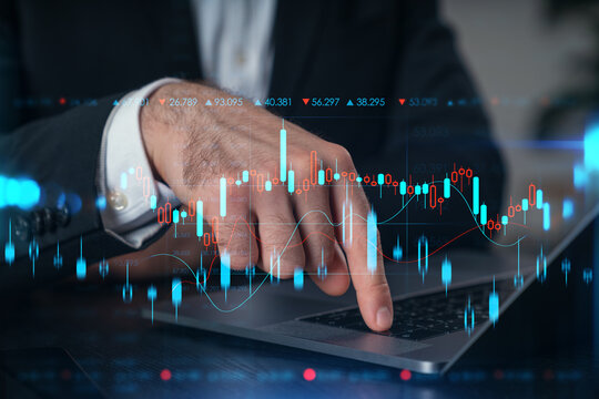 Woman typing on laptop at office workplace in background. Concept of working process, internet surfing, online business education. Student send e-mail. Close up view. Hands Shot. Stock market chart