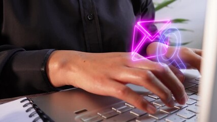 Control and analysis of email communication. Close-up view of an executive typing on her laptop with a virtual icon of a mail envelope with a magnifying glass. - Powered by Adobe