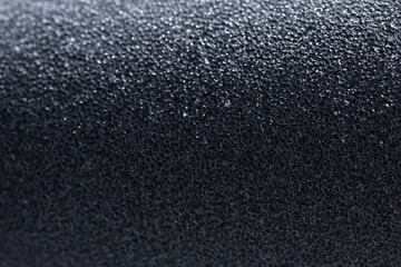 거친 입자의 어두운 스펀지 질감 텍스처