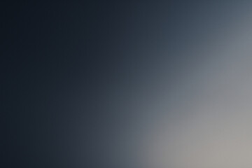 Soft abstract gradient blending pale navy and gray tones creating a calm elegant minimalist background with subtle depth