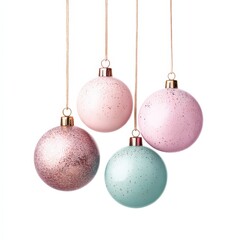 Four decorative Christmas ornaments in pastel colors, including pink and mint, hang from golden strings, adding a festive touch to any holiday decor.