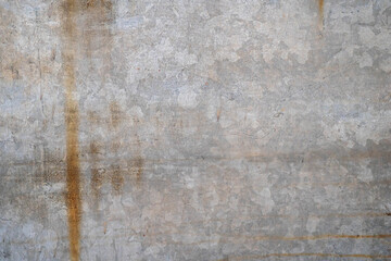 Abstract texture with rust and stains on a concrete wall.
