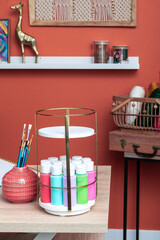 Home Interior Design - Craft Room Creative Home Office with craft accessories, painted wall, and decorative elements