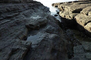 Rugged Coastal Rocks and Ocean Channel