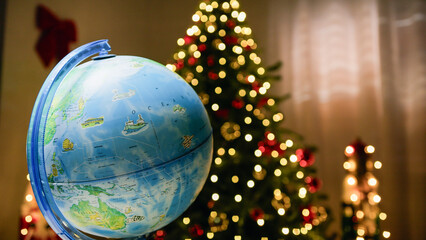 Globe showing different Countries under the tree
