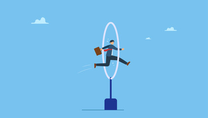 Skillful businessman winner jump through the hoop. Capability or employee competence, skill and performance to achieve success, challenge or motivation to overcome obstacle, winning.