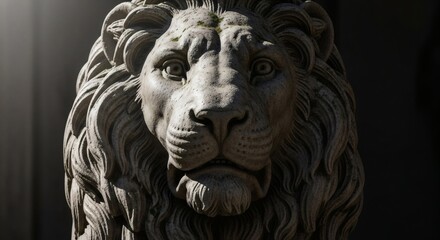 Obraz premium Close-up of a weathered stone lion statue with intricate details, dramatic lighting.