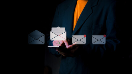 New messaging communication concept on a mobile smartphone, a businessman checking work email, a digital newsletter, email marketing, a technology business, and a freelance work concept.