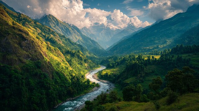Colorful himalayan landscape at sunset with towering mountains, winding river, lush green forest, blue sky with clouds, and golden sunlight illuminating a serene summer mountain valley in nepal