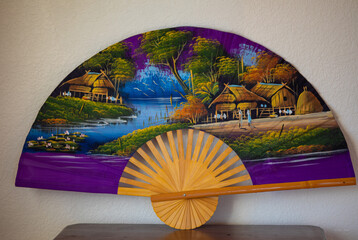 Thai large fan with purple houses vivid colours