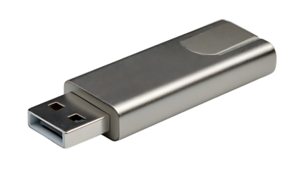 A sleek silver usb flash drive isolated on a completely black background
