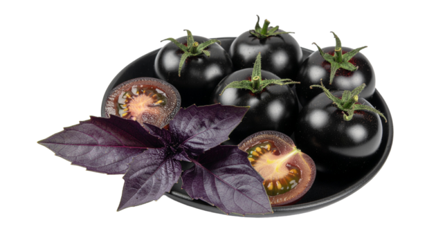 Black tomatoes and purple basil leaves on a black plate, with two tomato halves also visible, isolated on white. alpha channel