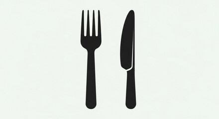 Classic black silhouette of a fork and knife, essential dining utensils for a meal, symbolizing food, restaurant, and kitchen concepts