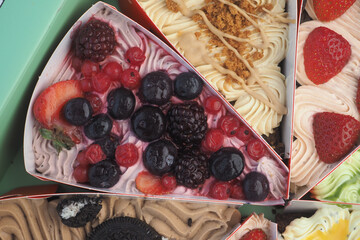 Delicious berry cake slice served at a dessert shop