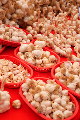 Fresh garlic for sale at a local market in autumn
