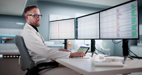 Man Managing Healthcare Coding Audit In Hospital Billing Department