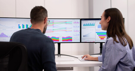 Financial Analyst Analyzing Sankey Chart Dashboard
