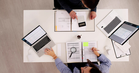 Busy Accountants Discussing Tax Strategies With Clients