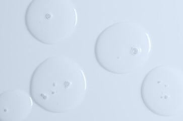 Transparent cosmetic product. Face serum or cleanser gel or body moisturizing gel.