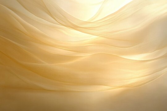 Flowing golden sheer fabric creates a delicate, wavy abstract background with soft light and shadow play, conveying elegance and tranquility.