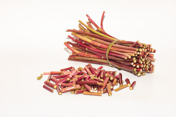 Basella alba with red stems is a vibrant, nutrient-rich climbing vine valued for food and medicine.
