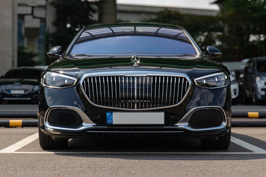 Front view of MAYBACH sedan with vertical chrome grille in outdoor parking - Seoul, South Korea - August 21 2022