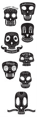 Vector illustration of abstract black and white ornaments featuring a scary skull and human bones symbol
