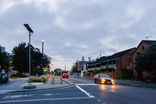 City road intersection at night in Newcastle NSW Australia near tram stop