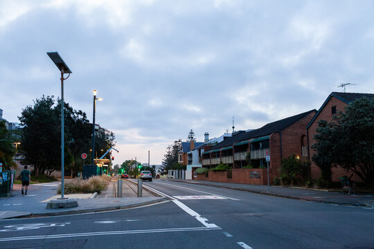 City road intersection at night in Newcastle NSW Australia near tram stop