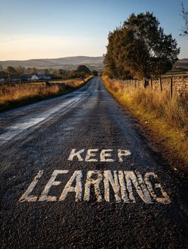 keep learning written on rural road no logos no brands ar 34