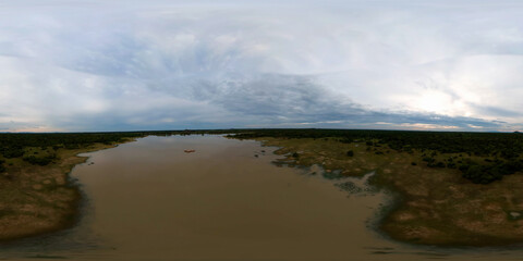 Aerial drone of Panama Wewa lake in Sri Lanka. Tropical jungle landscape. Virtual Reality 360. Arugam bay.