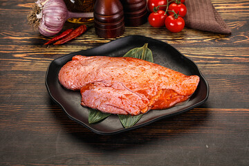 Raw marinated duck breast for cooking