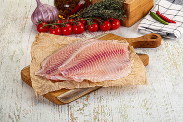 Raw Tilapia fish fillet slice