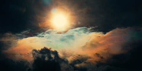 Dramatic Sun Above Colorful Iridescent Clouds