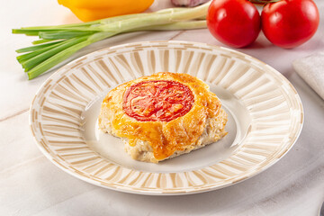 Chicken chop cutlet with cheese and tomato