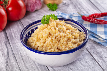 Vegan cuisine - boiled bulgur garnish