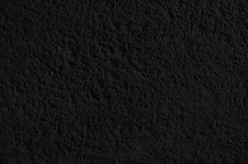 Textured surface of rugged rock. Porous rock surface with rough, natural details.