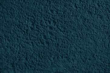 Textured surface of rugged rock. Porous rock surface with rough, natural details.